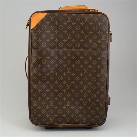 louis vuitton oversized luggage tag bag|louis vuitton suitcase with wheels.